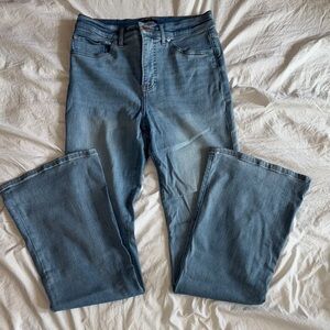 Express Women’s High Rise Flare leg Jean, light wash, size 6 Long.